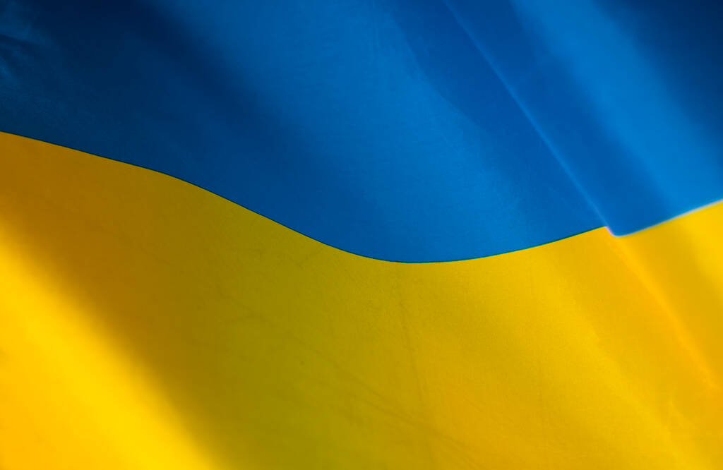 Flag of Ukraine. Blue and yellow colors. Close up shot, background - Photo, Image