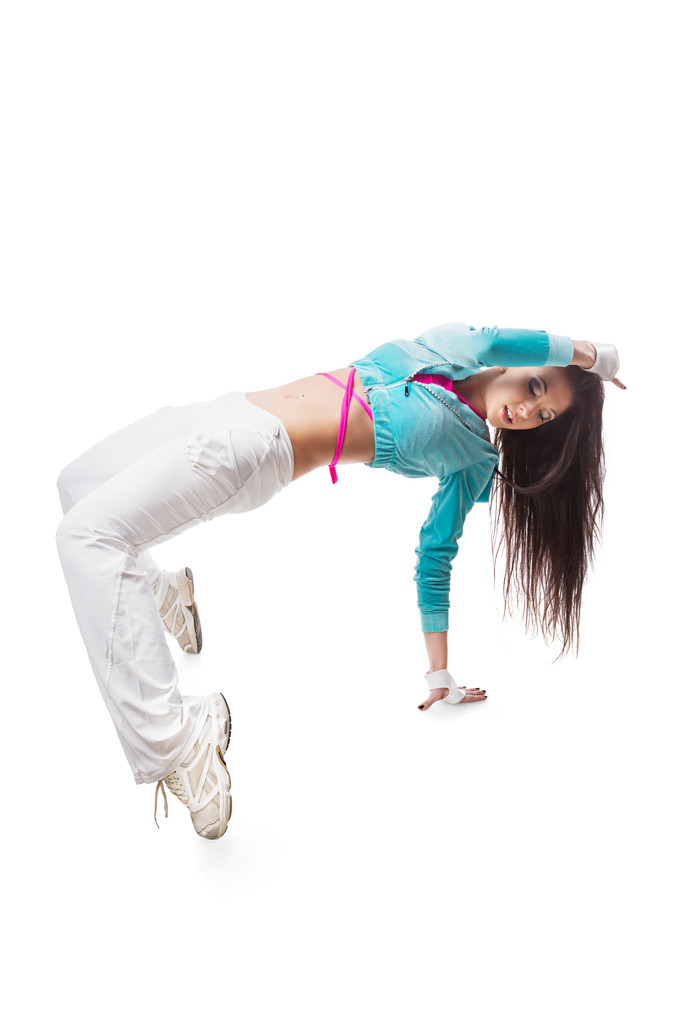Nuori moderni joustava hip-hop tanssi tyttö taipuu taaksepäin silta aiheuttaa roikkuu hiukset
.  - Valokuva, kuva