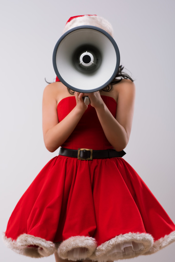 Mujer de Navidad con megáfono
 - Foto, Imagen