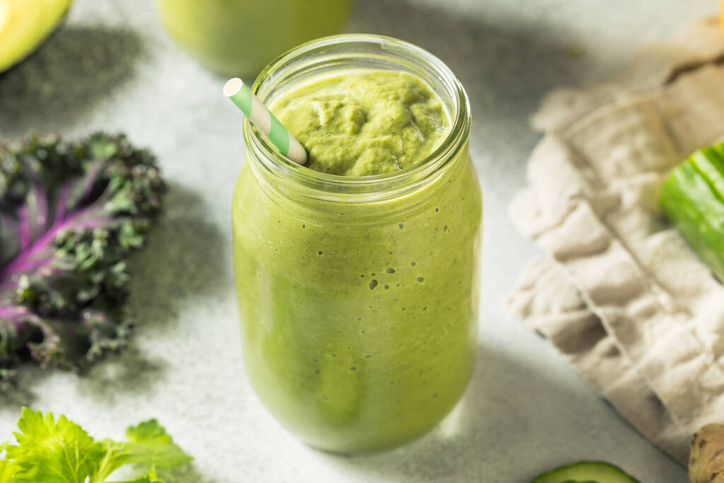Healthy Organic Detox Green Smoothie with Kale Spinach and Cucumbers - 写真・画像