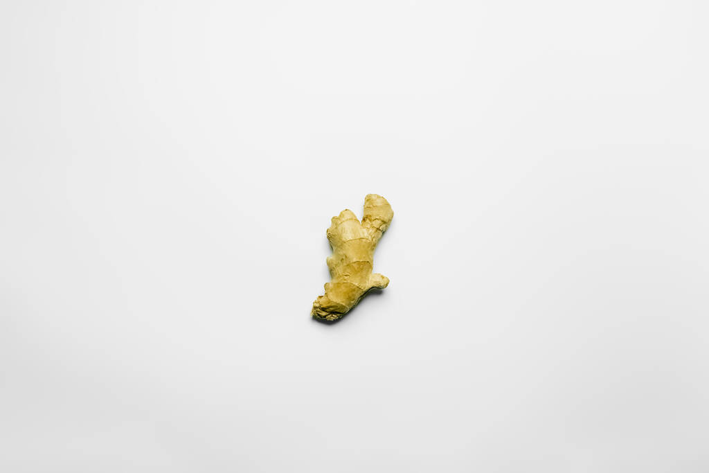 Top view of ripe ginger on white background  - Fotó, kép