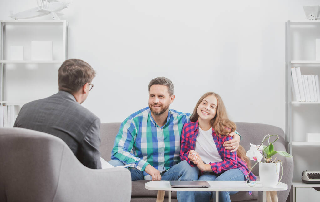 Parents telling the psychologist about child problems. Psychologist with father and daughter, psychotherapist listen mental health of dad and child teen, Psychological parents problem. - Photo, Image