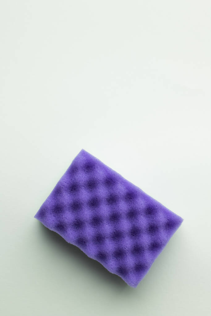 top view of bright purple sponge on grey background - 写真・画像