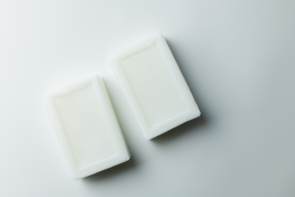 top view of white cleansing soap on grey background - Photo, Image
