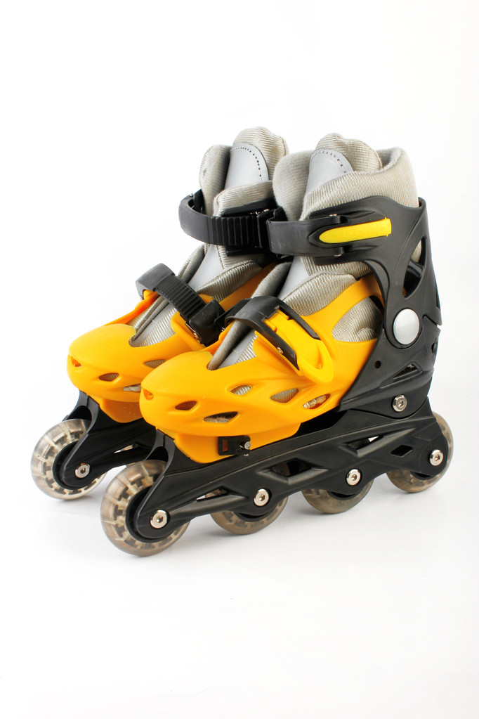 Yellow & Black Colored roller skates isolated on white - Photo, Image