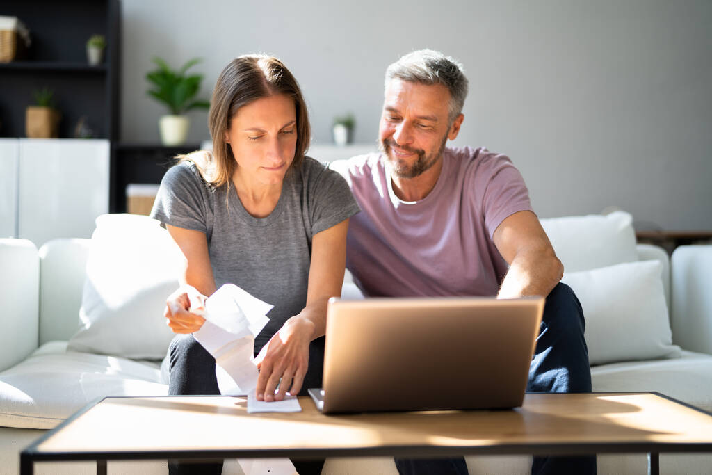 Couple Doing Taxes And Family Budget On Computer - Photo, Image