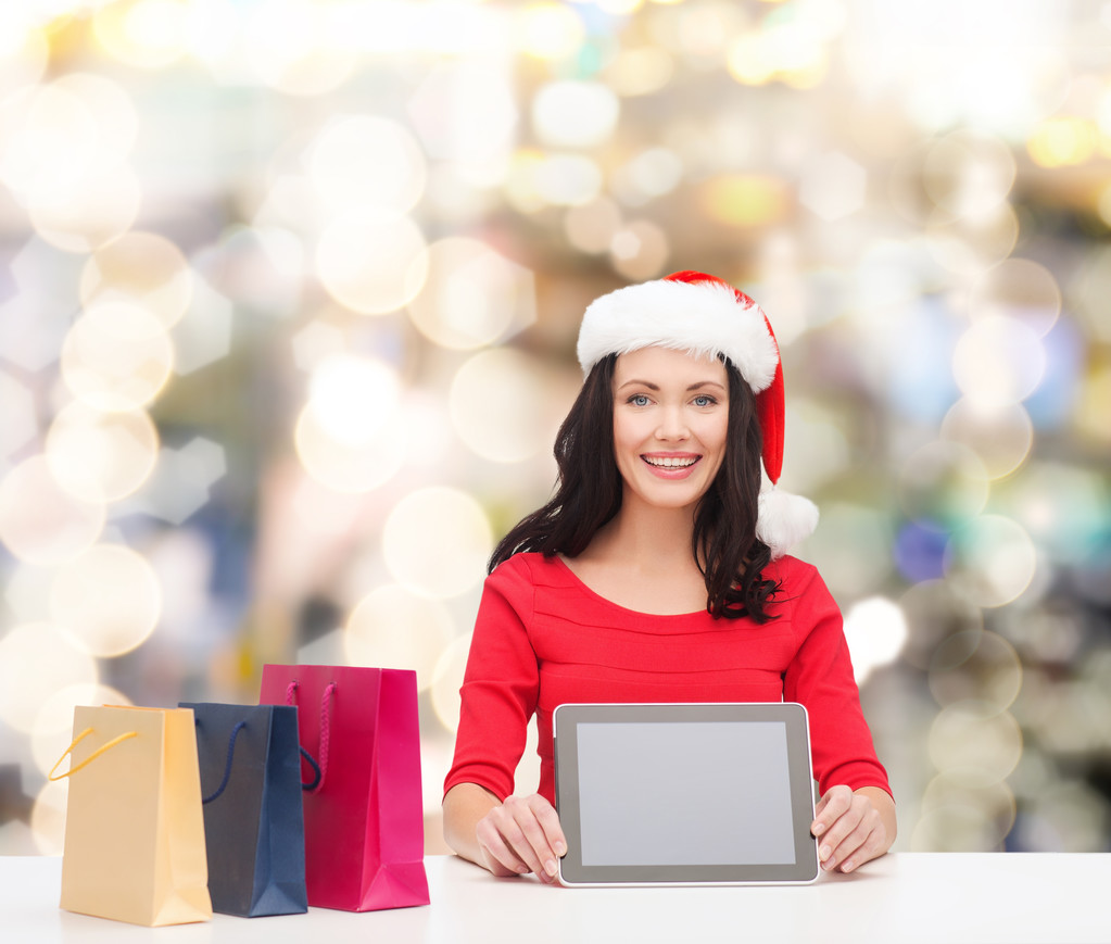 smiling woman with shopping bags and tablet pc - Photo, Image