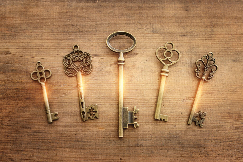 Top view image of old keys over wooden background - Photo, Image