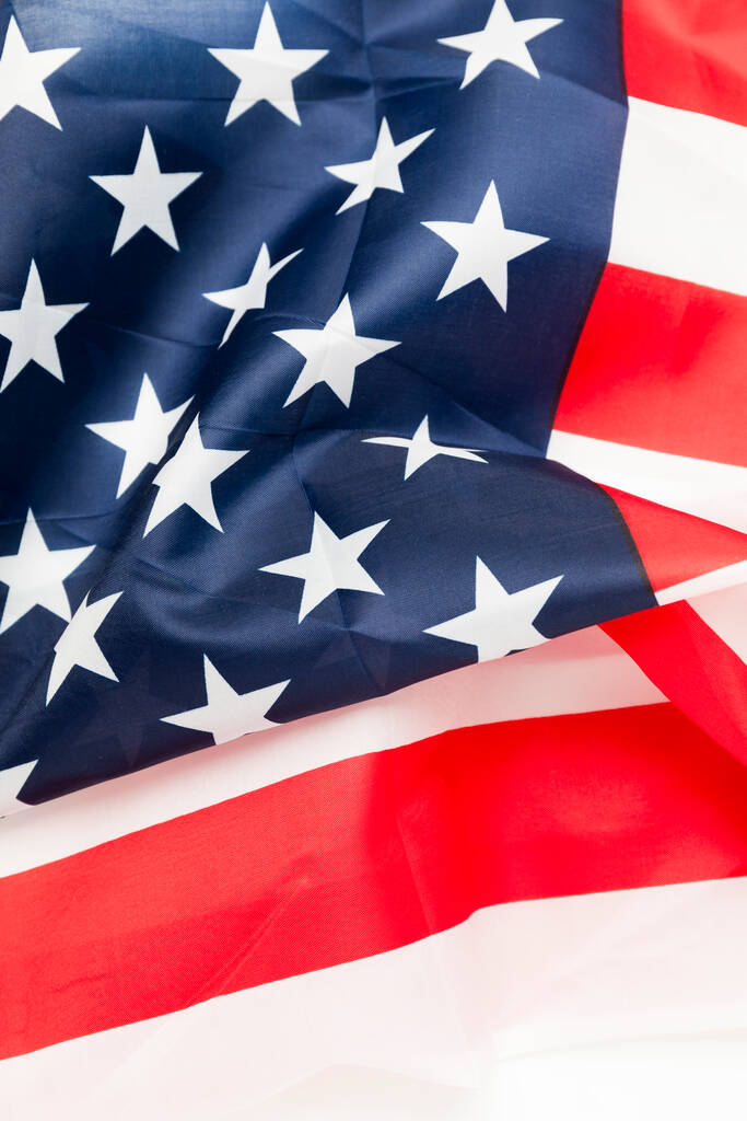 USA vlag achtergrond met plooien ontwikkelen in de wind. Amerikaanse onafhankelijkheid en vrijheid. - Foto, afbeelding