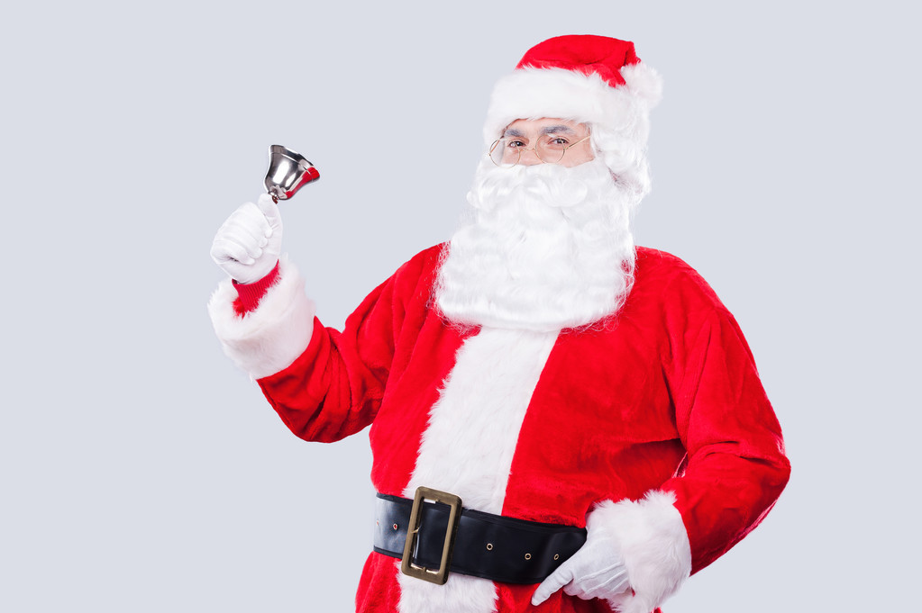Santa Claus tocando una campana
 - Foto, Imagen
