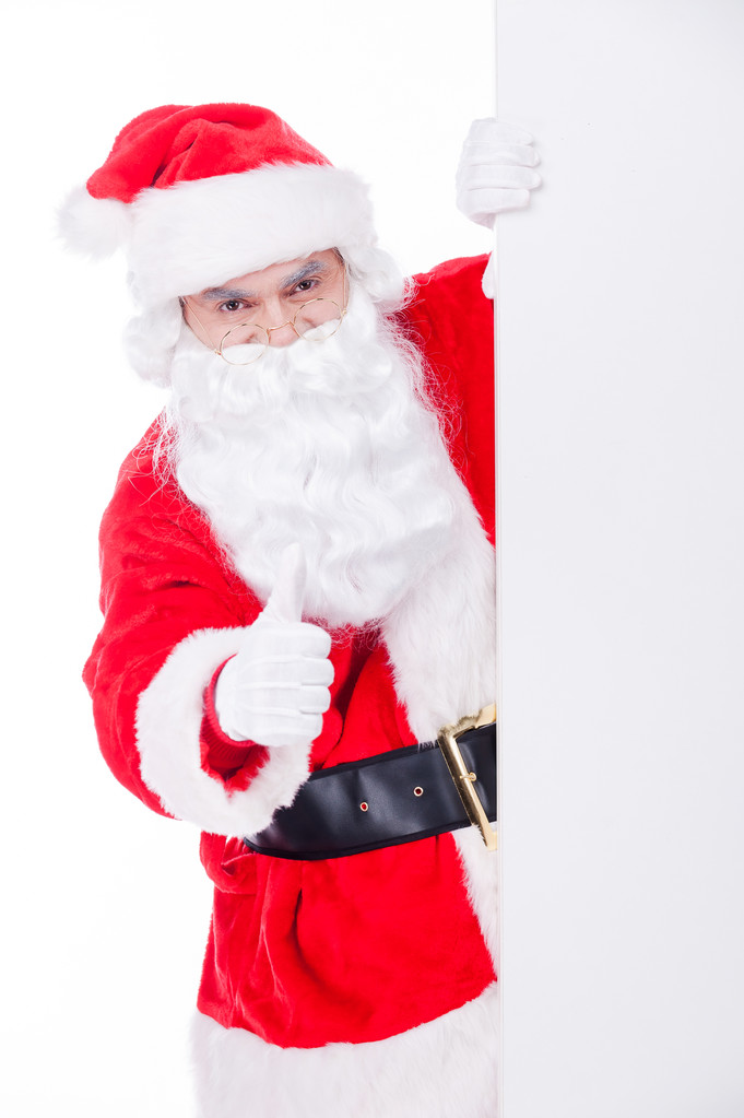 Santa Claus a hüvelykujját mutatja fel - Fotó, kép