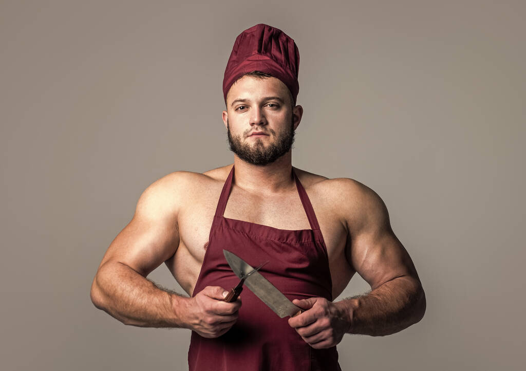 svalnatý muž řezník v kuchař zástěra držet nůž kuchyňské nádobí, vaření. - Fotografie, Obrázek