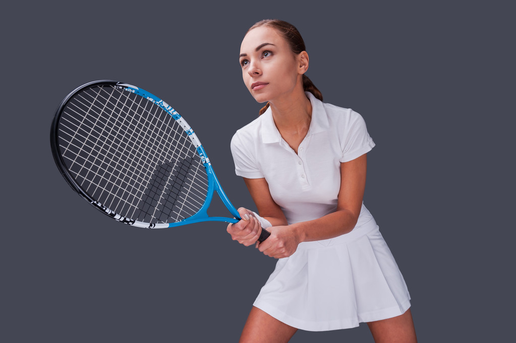 Femme tenant raquette de tennis
 - Photo, image