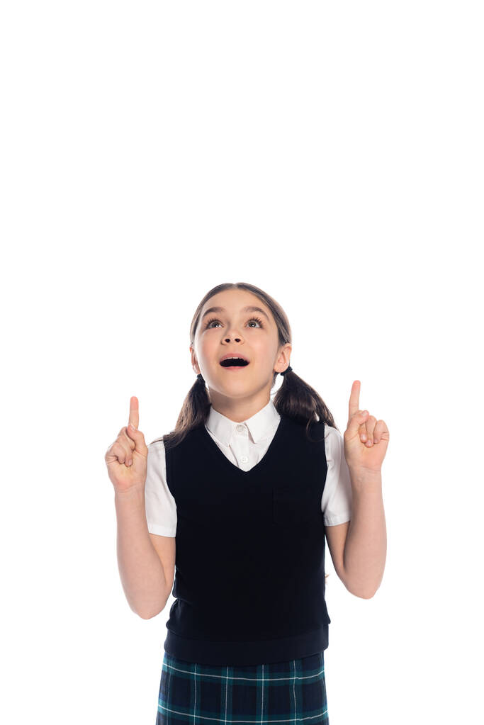 Estudante animado apontando com os dedos isolados no branco  - Foto, Imagem