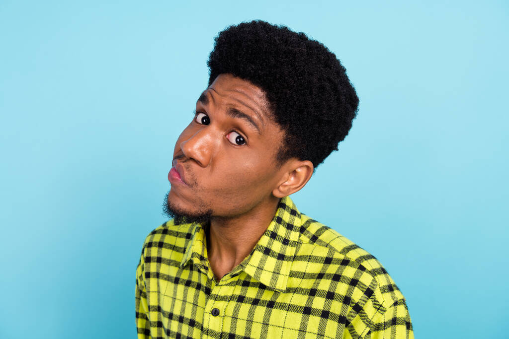 Photo of young suspicious afro american man look you doubt face upset isolated on pastel blue color background. - Photo, image