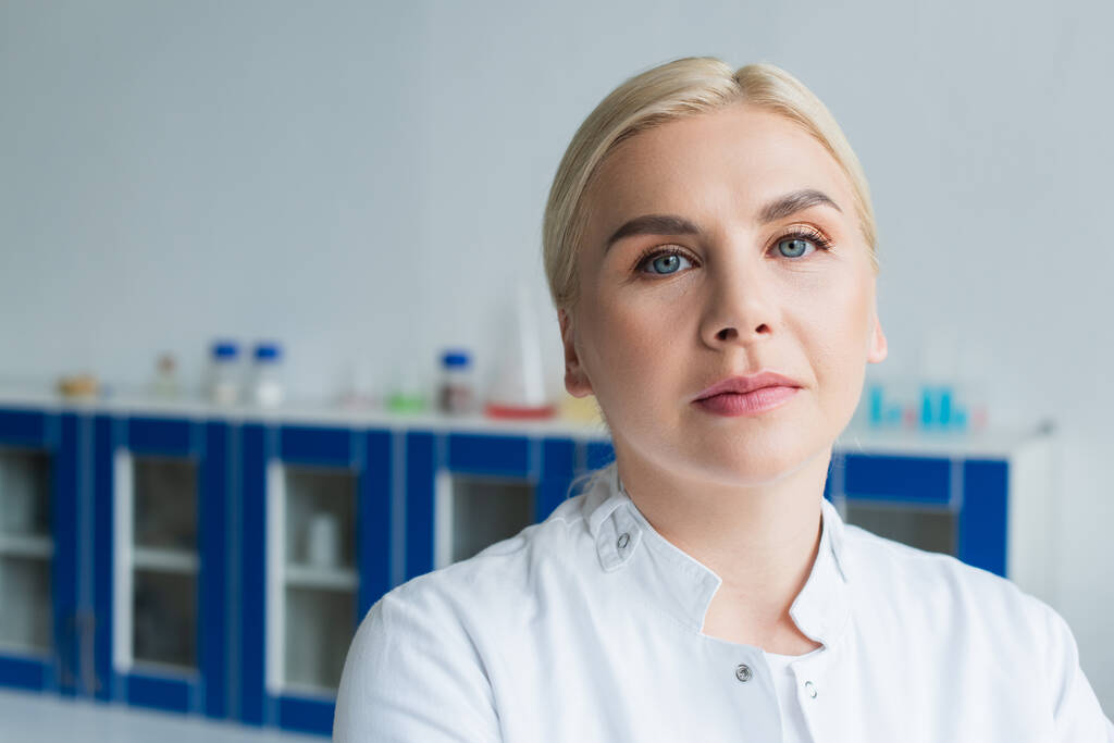 Portrait of scientist in white coat in laboratory  - Fotografie, Obrázek