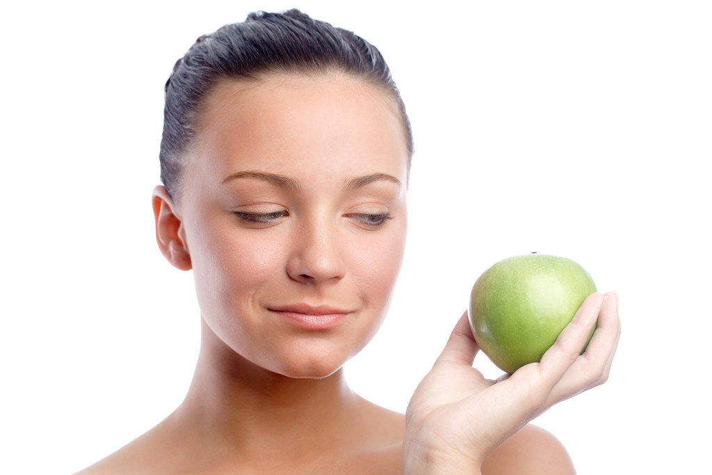 Mulher com maçã verde
 - Foto, Imagem
