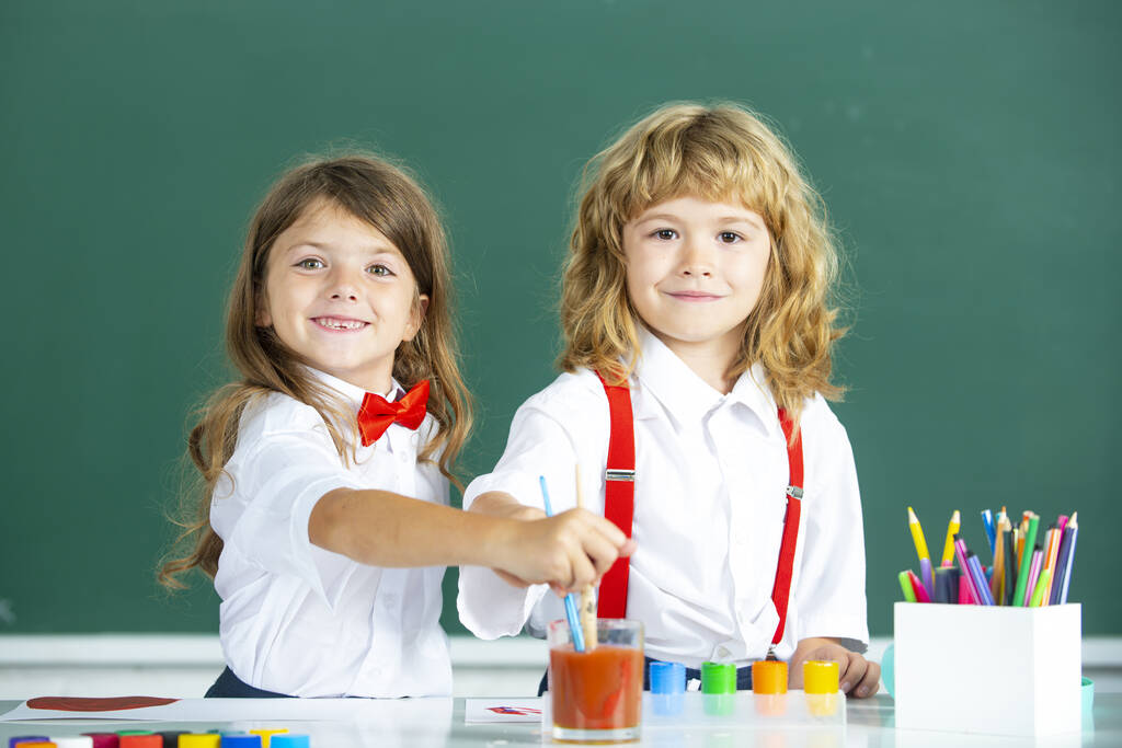 Back to school. Two little schoolkids. Education and friendship in school concept - Foto, Imagen