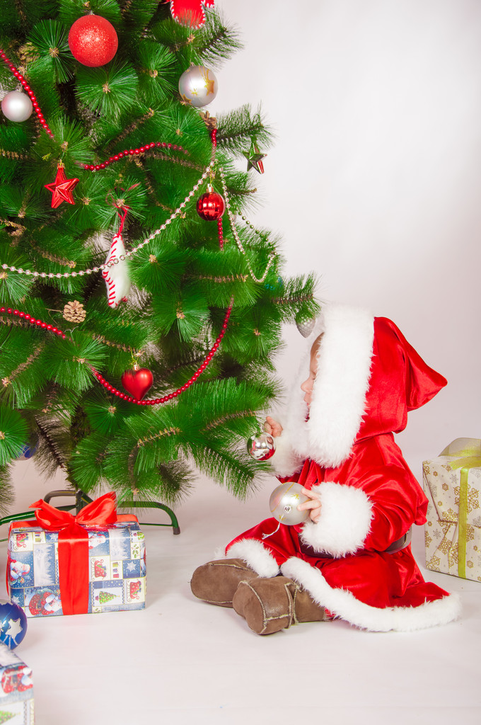 A Santa ruha, a karácsonyfa baba - Fotó, kép