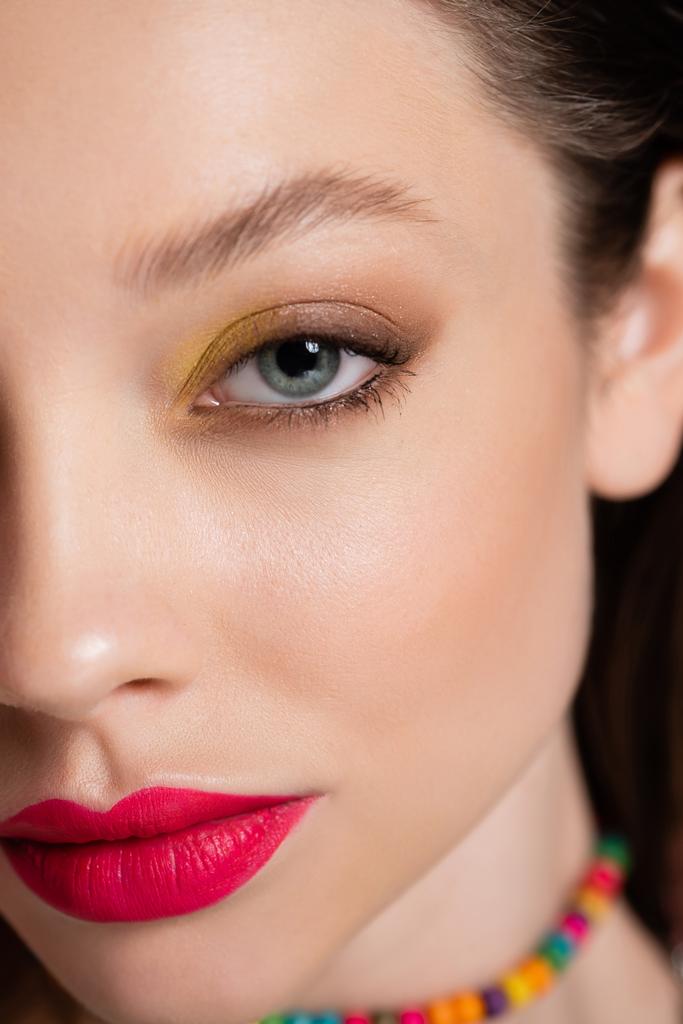 close up of cropped young model with bright makeup looking at camera - Foto, Bild