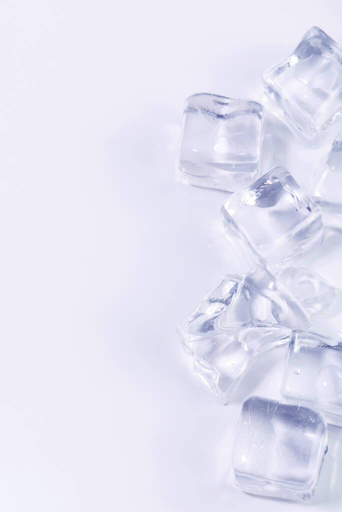 creative summer photo of ice, white background - Fotó, kép
