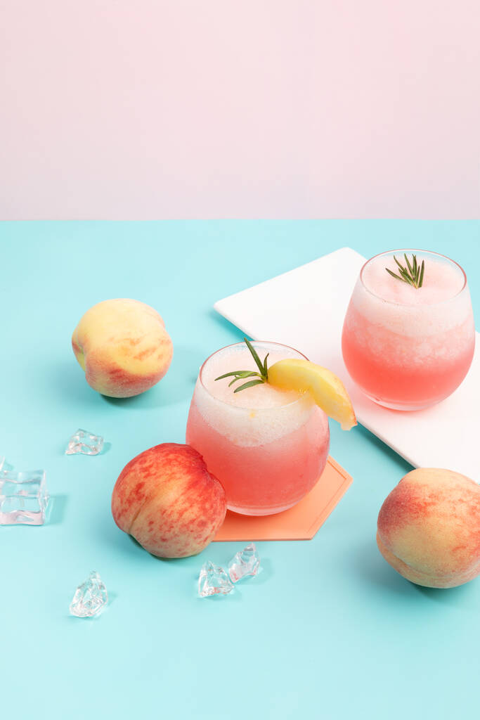 summer background with peach ade drink with peaches fruit - Photo, Image