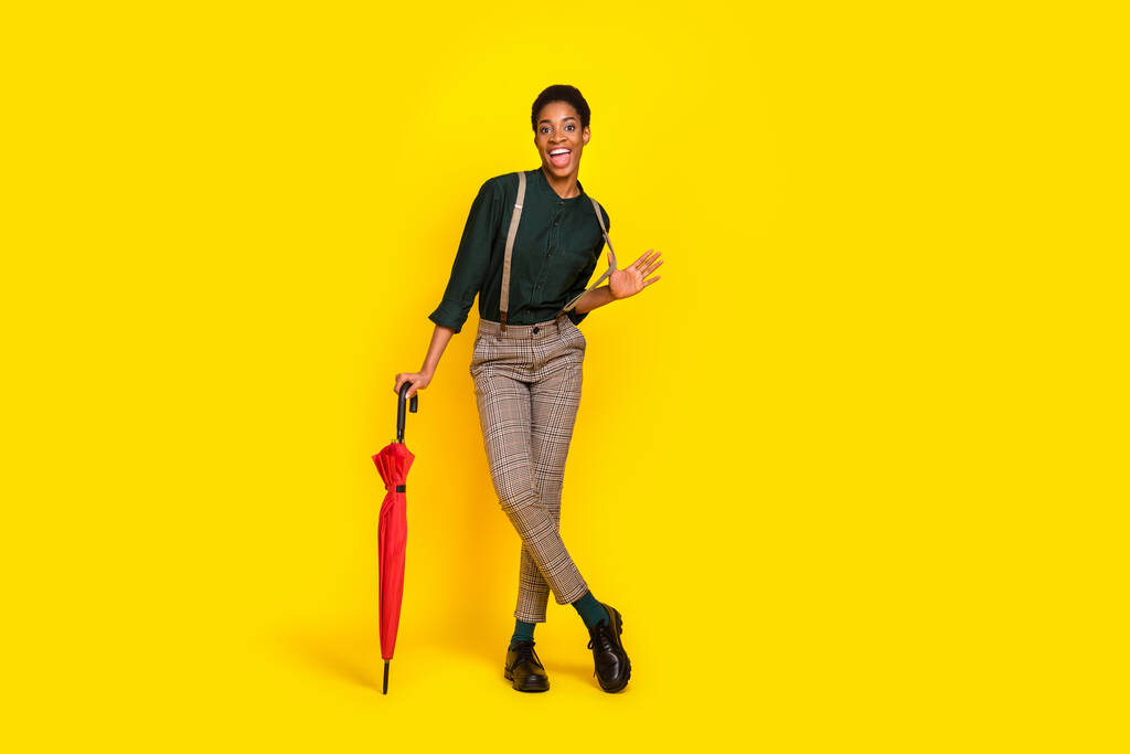 Full length body size view of attractive cheerful woman posing good mood isolated over vibrant yellow color background. - Fotoğraf, Görsel