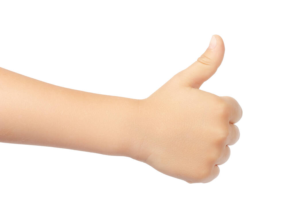 Approving gesture. The hand shows a thumbs up. Thumb up isolated on white background. High quality photo - Photo, image
