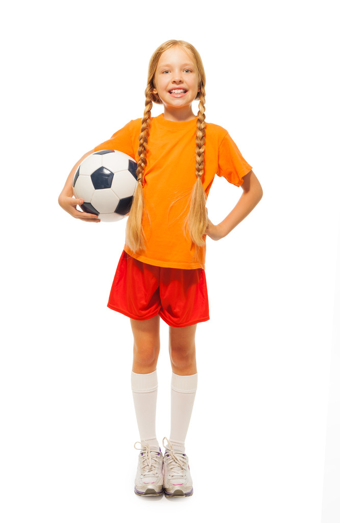 Chica sosteniendo pelota de fútbol
 - Foto, Imagen