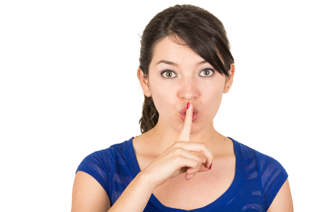 beautiful young woman gesturing silence shhh with finger on mouth - Photo, Image