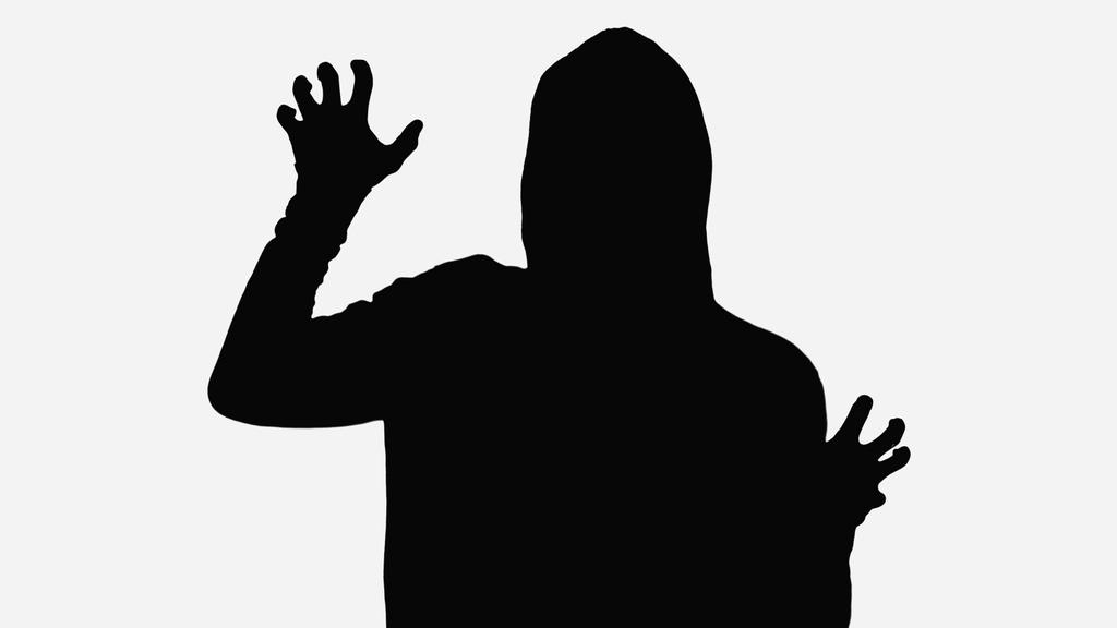 чорний силует зомбі-чоловіка, що показує жест ізольований на білому
 - Фото, зображення