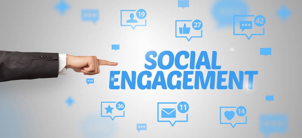 Close-up van bijgesneden hand wijzend op SOCIALE ENGAGEMENT inscriptie, social networking concept - Foto, afbeelding