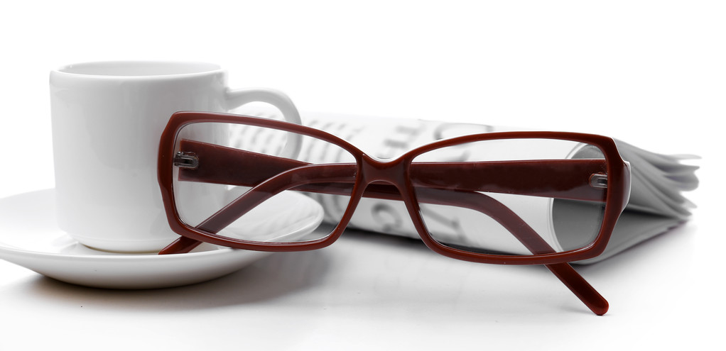 Óculos e jornais fundo
 - Foto, Imagem