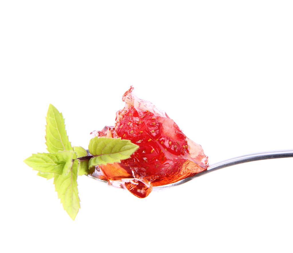 Jalea de fresa en una cuchara
 - Foto, imagen