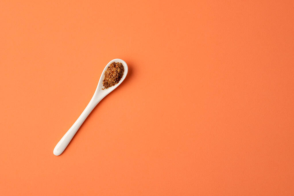 Crushed flax seeds in the spoon - Linum usitatissimum - Photo, Image