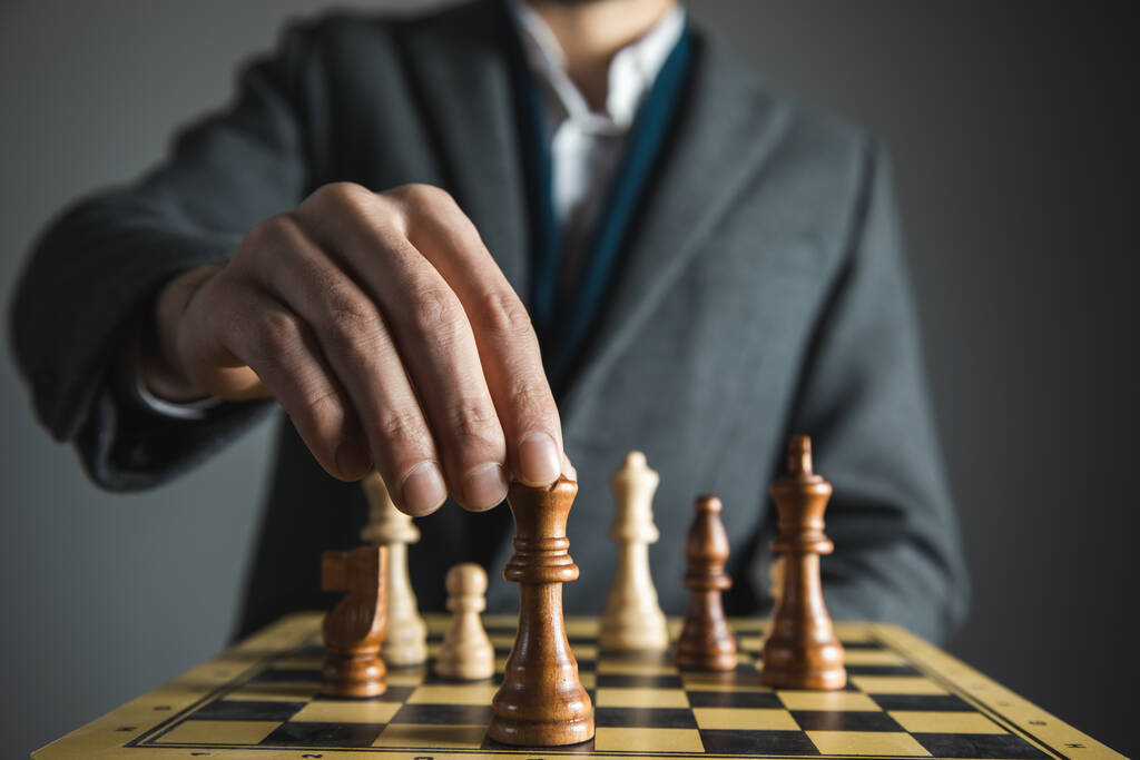 hands confident businessman colleagues playing chess game - Photo, Image