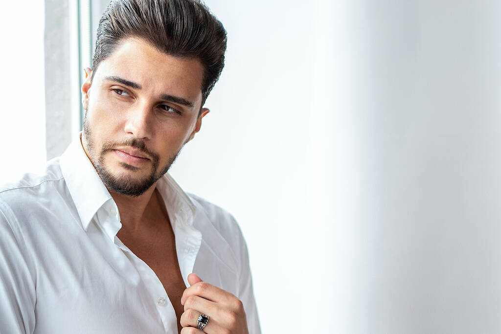 Portrait of successful, elegant man wearing white shirt, looking away. Handsome male model with beard. Closeup photo - Photo, Image