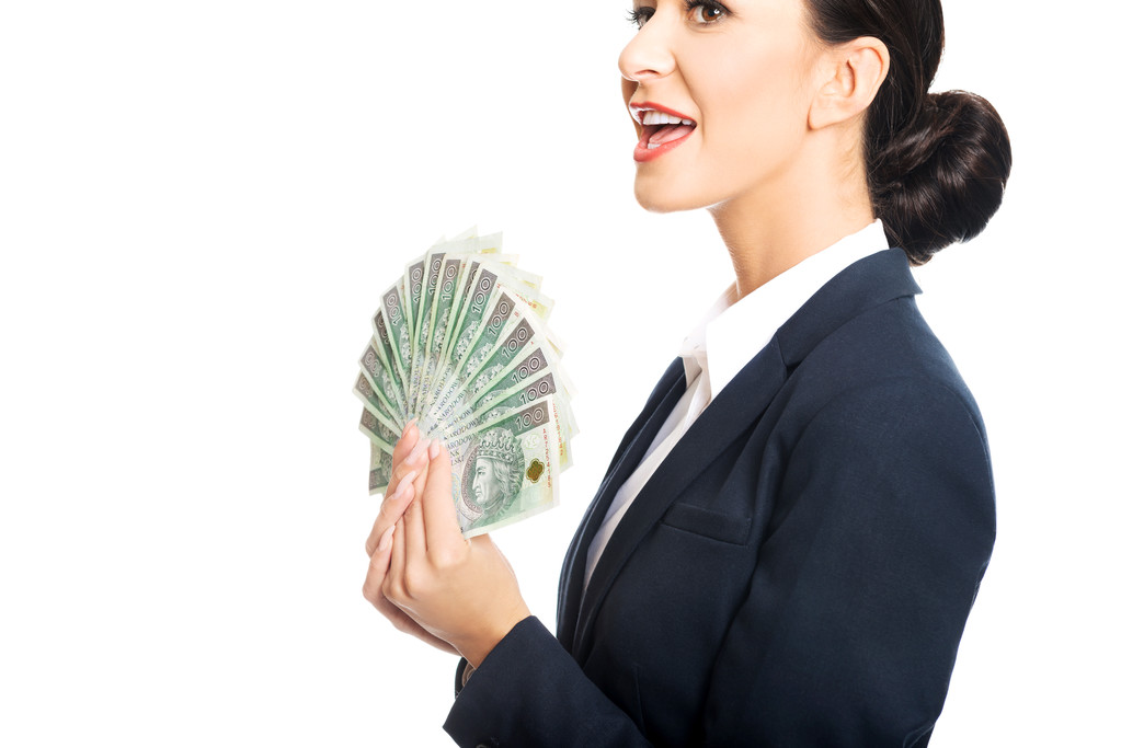 Femme d'affaires tenant un clip de l'argent polonais
 - Photo, image
