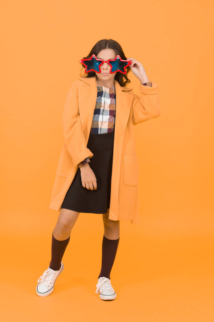 Fancy look. Little girl with autumn look. Party look of fashion schoolchild. Small child look geeky in star-shaped eyeglasses. School party. Holiday celebration. International childrens day. - Photo, Image