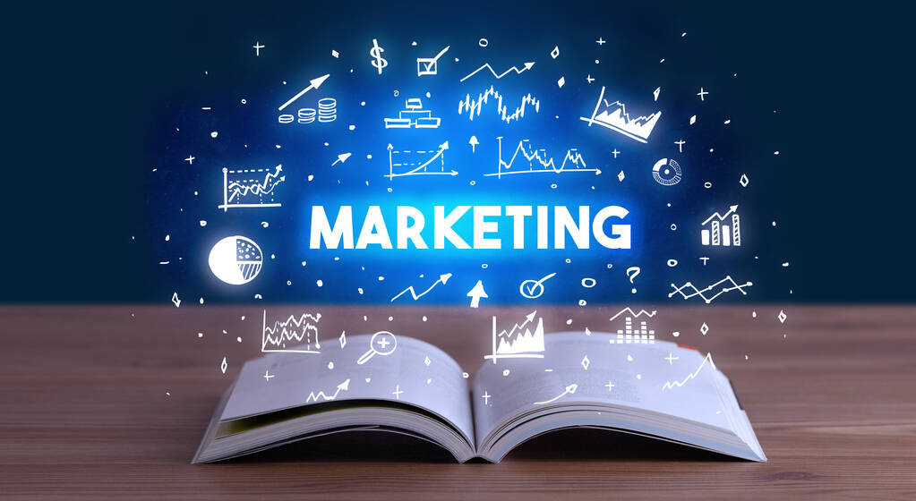 MARKETING inscription coming out from an open book, business concept - Photo, Image