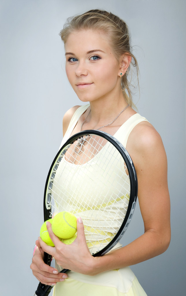 Dívka s tenisovou raketou - Fotografie, Obrázek