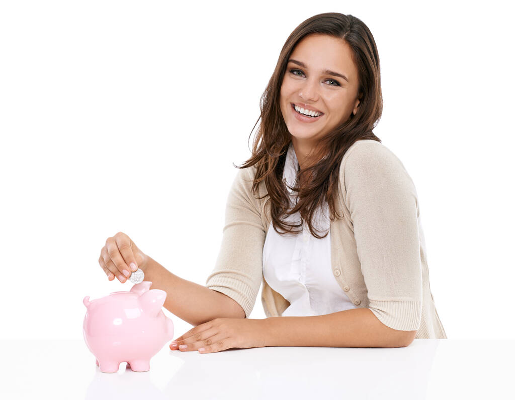 Money bank, savings and portrait of woman happy about saving, banking and investment for future. Female with a smile isolated on a white background for budget, security and coins in pig container. - Fotoğraf, Görsel