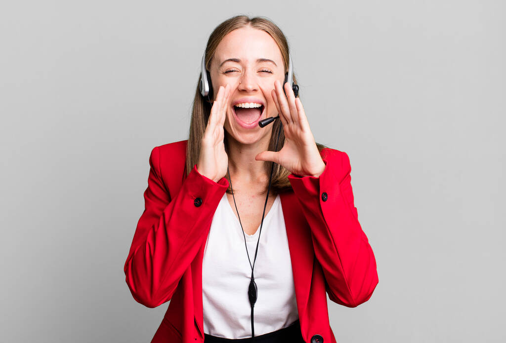 feeling happy,giving a big shout out with hands next to mouth. telemarketer concept - Foto, imagen