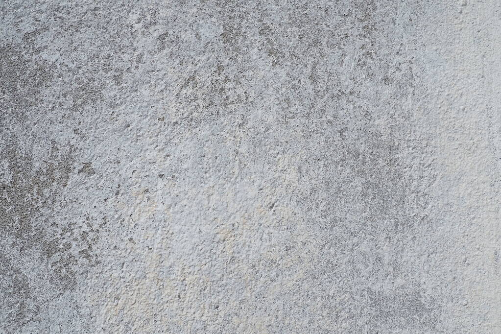 Sádrokartónová textura. Bílý povrch. Abstraktní pozadí. Retro zeď postavené struktury textury. Praskliny a rány na betonové stěně. Nerovnoměrné zbarvení s barvou na vodní bázi. Stará potrhaná omítka. - Fotografie, Obrázek