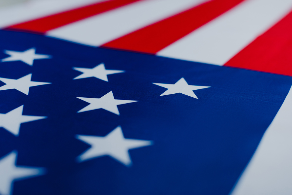 Nahaufnahme der Flagge der Vereinigten Staaten von Amerika mit Sternen und Streifen  - Foto, Bild