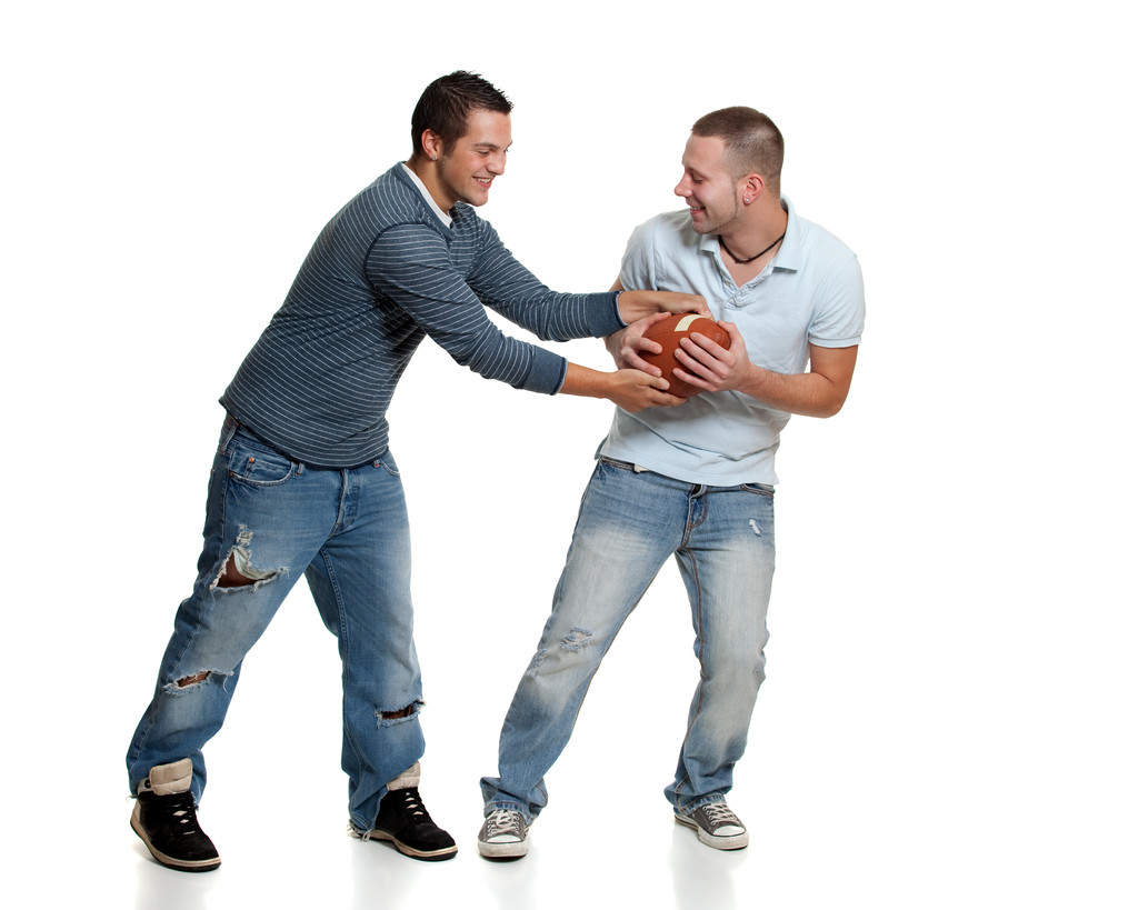 Due uomini con calcio
 - Foto, immagini