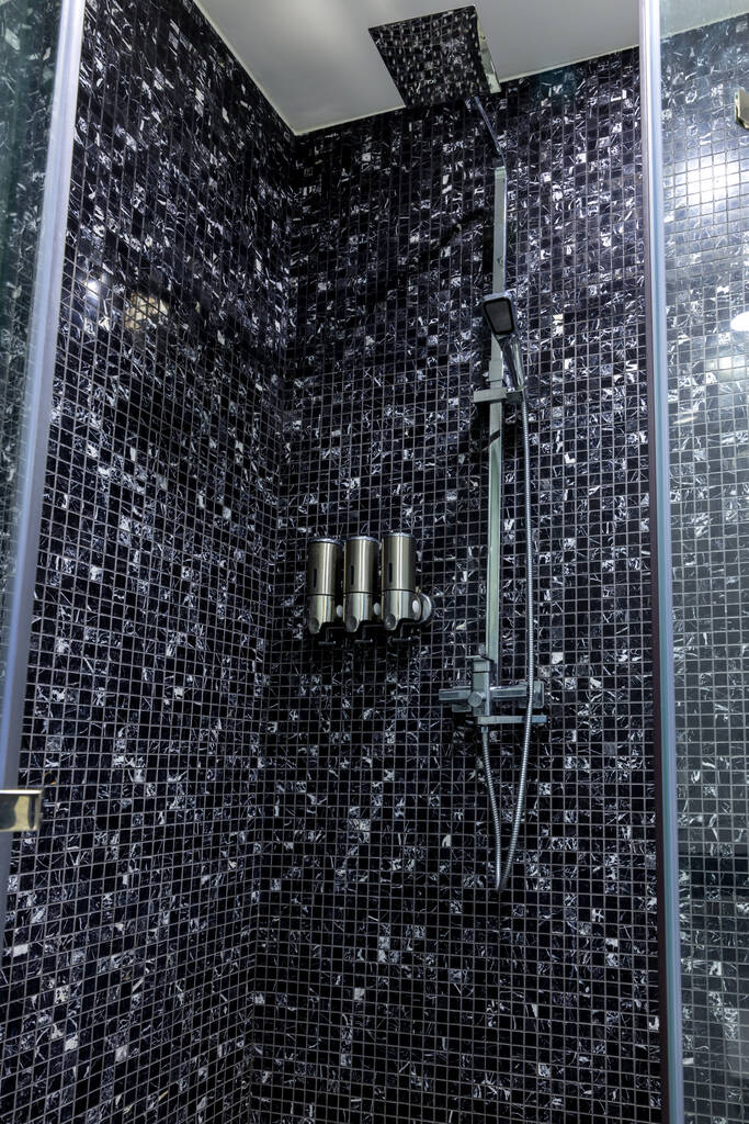 Shower at bathroom. Bathroom interior . Luxury fully tiled shower with rain head and hand held shower rose.	 - Foto, Imagen