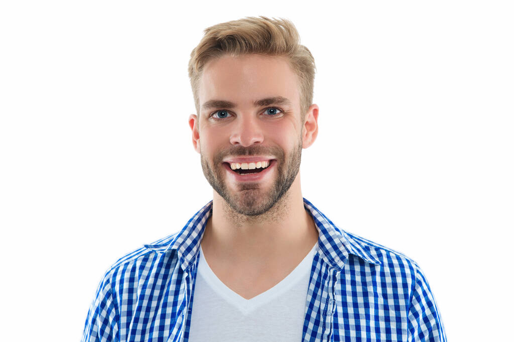 cheerful young man on background. young man in studio. photo of young man wearing checkered shirt. young man isolated on white. - Photo, Image