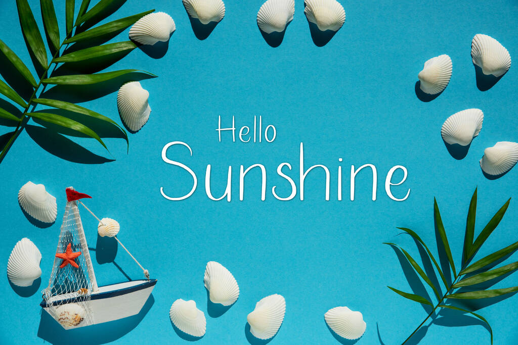 Flat Lay With English Text Hello Sunshine. Turquoise Or Blue Background With Maritime Decoration Like Boat, Shells And Palm Leaf. - Photo, Image