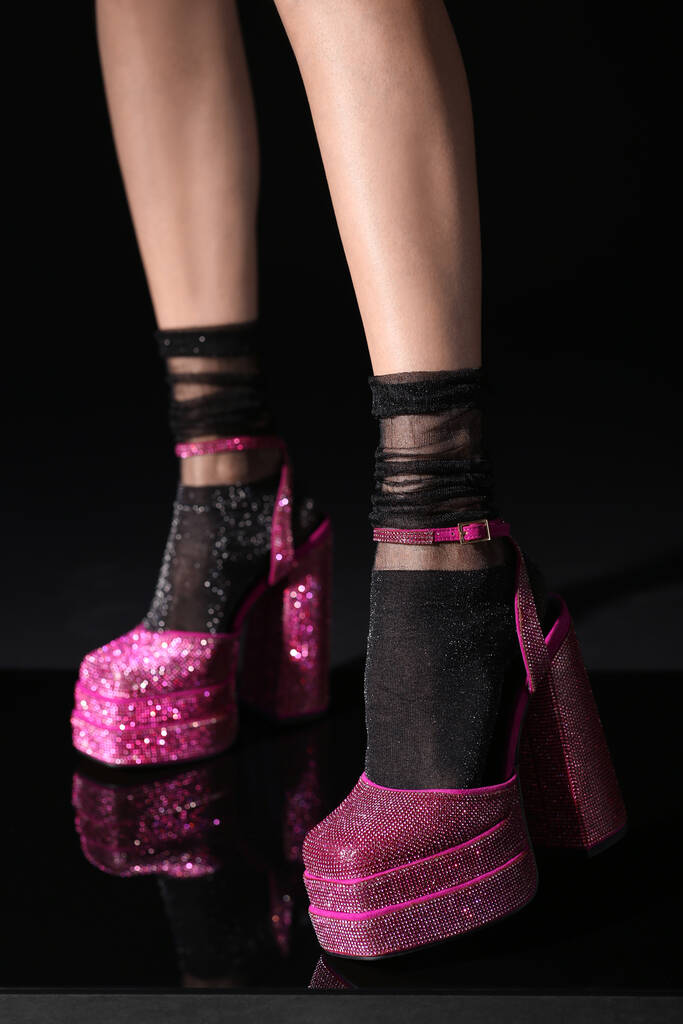Woman wearing pink high heeled shoes with platform and square toes on black background, closeup - Φωτογραφία, εικόνα